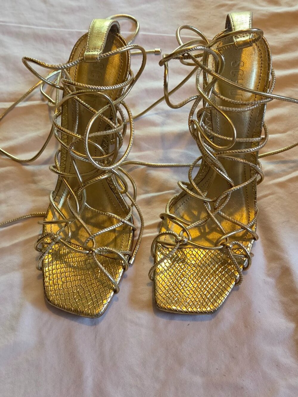 Gold strappy heels
